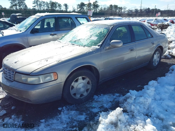 2001 Cadillac Seville Luxury SLS w/Monochrome Pkg with VIN 1G6KS54YX1U103892, listed as a IAAI auction lot 41550499 with 999,999 mi miles. Bid and sale history available at carsss.com. Image 2.