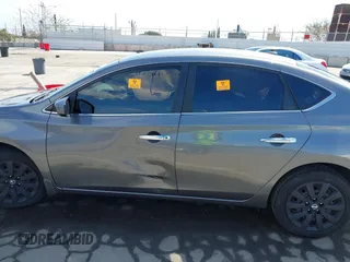 2015 Nissan Sentra SV z VIN 3N1AB7AP6FL681976, wystawiony jako IAAI lot #41900869 z przebiegiem Nie podano mil oraz . Historia ofert i sprzedaży dostępna na DreamBid. Obrazek 14.