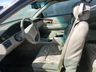 2000 Cadillac Eldorado z VIN 1G6EL12Y7YU198685, wystawiony jako Copart lot #75093094 z przebiegiem Nie podano mil oraz Szkody całkowita. Historia ofert i sprzedaży dostępna na DreamBid. Obrazek 7.