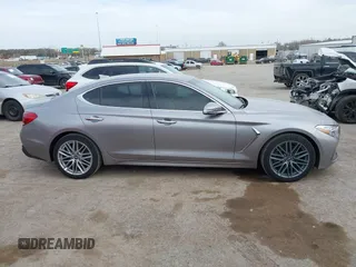 2021 Genesis G70 2.0T with VIN KMTG64LA9MU073635, listed as a IAAI auction lot 41829019 with 47,186 mi miles and . Bid and sale history available at DreamBid. Image 13.