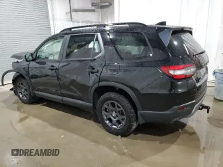 2024 Honda Pilot TrailSport with VIN 5FNYG1H69RB026415, listed as a Copart auction lot 71098474 with 0 mi miles and Salvage Title. Bid and sale history available at carsss.com. Image 2.