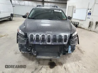 2015 Jeep Cherokee Latitude with VIN 1C4PJMCS0FW787988, listed as a Copart auction lot 52105155 with 117,254 mi miles and Salvage Title. Bid and sale history available at DreamBid. Image 5.
