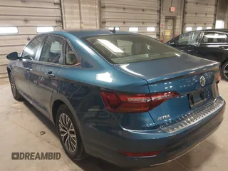 2019 Volkswagen Jetta SEL z VIN 3VWE57BU2KM116717, wystawiony jako IAAI lot #41951428 z przebiegiem 85 791 mil mil oraz . Historia ofert i sprzedaży dostępna na DreamBid. Obrazek 3.