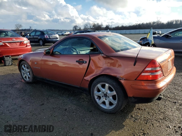 2000 Mercedes-Benz SLK 230 Kompressor с VIN WDBKK47F0YF145180, выставлен на аукционе Copart как лот 86648924 с пробегом 130 460 миль миль и Списание • Salvage title. История ставок и продаж доступна на DreamBid. Изображение 2.