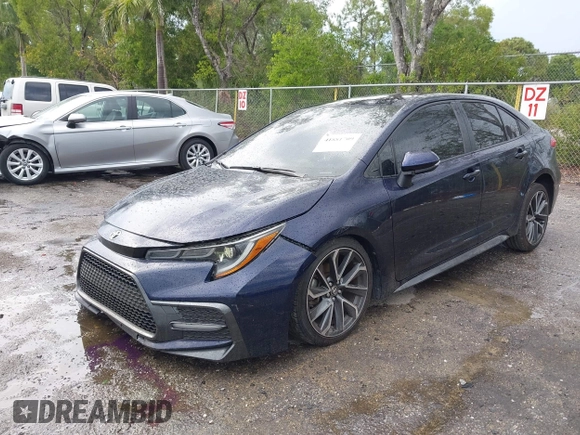 2021 Toyota Corolla SE with VIN JTDS4MCE6MJ054785, listed as a IAAI auction lot 41881709 with 62,833 mi miles. Bid and sale history available at carsss.com. Image 6.