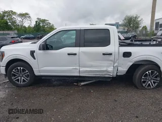 2023 Ford F-150 XL with VIN 1FTEW1EP5PFB87582, listed as a IAAI auction lot 42254015 with 10,476 mi miles and . Bid and sale history available at DreamBid. Image 14.