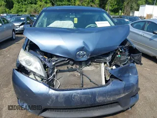 2013 Toyota Sienna LE with VIN 5TDJK3DC6DS070951, listed as a IAAI auction lot 42468510 with 235,537 mi miles and . Bid and sale history available at DreamBid. Image 12.