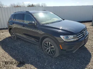 2021 Volkswagen Tiguan SE with VIN 3VV2B7AX9MM058863, listed as a Copart auction lot 50758525 with 49,298 mi miles and Clean Title. Bid and sale history available at DreamBid. Image 4.