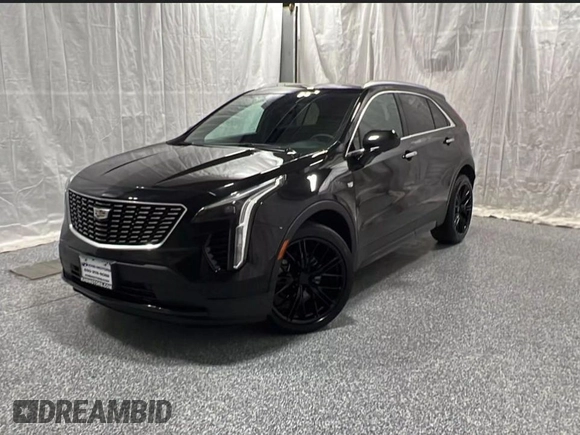 2019 Cadillac XT4 FWD Premium Luxury with VIN 1GYFZCR45KF142250, listed as a Copart auction lot 63934705 with 92,410 mi miles and Clean title. Bid and sale history available at DreamBid. Image 2.