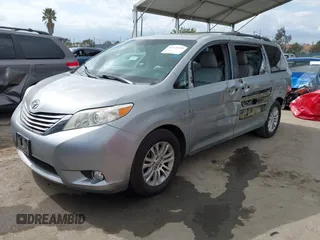 2015 Toyota Sienna XLE with VIN 5TDYK3DC1FS611521, listed as a IAAI auction lot 42136356 with 102,734 mi miles. Bid and sale history available at carsss.com. Image 18.