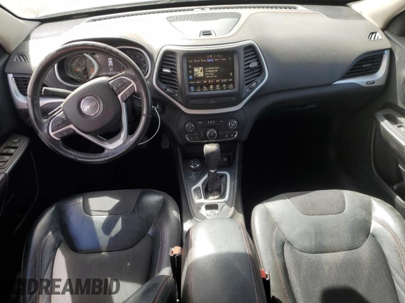 2015 Jeep Cherokee Trailhawk with VIN 1C4PJMBS3FW787033, listed as a Copart auction lot 49176735 with 83,013 mi miles and Salvage Title. Bid and sale history available at carsss.com. Image 8.