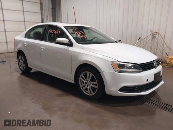2011 Volkswagen Jetta SE z VIN 3VWDZ7AJ9BM323290, wystawiony jako IAAI lot #41877681 z przebiegiem 115 307 mil mil oraz . Historia ofert i sprzedaży dostępna na DreamBid. Obrazek 1.