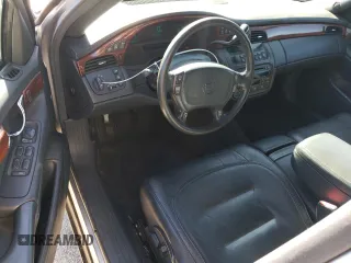2003 Cadillac DTS Professional 1SH z VIN 1GEEH00Y93U500263, wystawiony jako Copart lot #77037214 z przebiegiem 63 197 mil mil oraz Tytuł czysty. Historia ofert i sprzedaży dostępna na DreamBid. Obrazek 8.