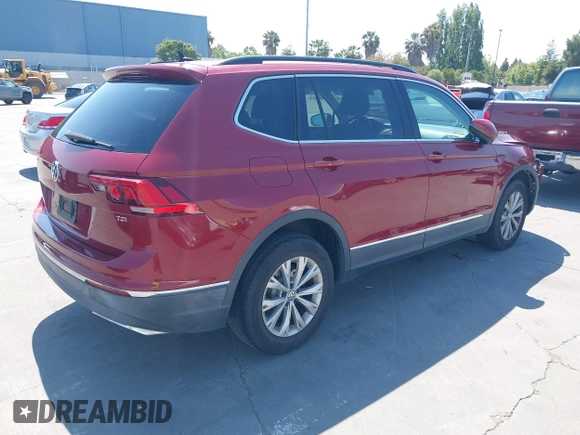 2018 Volkswagen Tiguan SEL z VIN 3VV3B7AX1JM214734, wystawiony jako IAAI lot #42473627 z przebiegiem 79 152 mil mil oraz . Historia ofert i sprzedaży dostępna na DreamBid. Obrazek 4.
