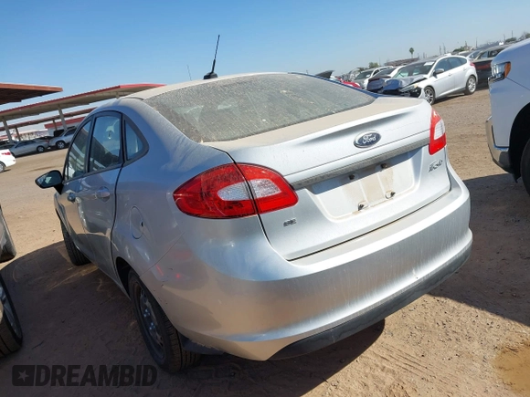 2013 Ford Fiesta SE z VIN 3FADP4BJ7DM165174, wystawiony jako IAAI lot #42311167 z przebiegiem 90 592 mil mil oraz . Historia ofert i sprzedaży dostępna na DreamBid. Obrazek 3.