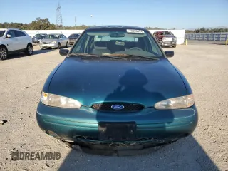 1997 Ford Contour z VIN 3FALP6536VM113346, wystawiony jako Copart lot #70036024 z przebiegiem 115 084 mil mil oraz Tytuł czysty. Historia ofert i sprzedaży dostępna na DreamBid. Obrazek 5.