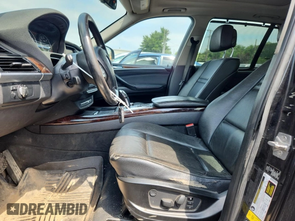 2012 BMW X5 35i with VIN 5UXZV4C5XCL765757, listed as a Copart auction lot 64497535 with 178,836 mi miles and Salvage title. Bid and sale history available at DreamBid. Image 7.