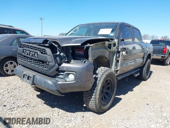2017 Toyota Tacoma SR5 with VIN 5TFCZ5AN0HX073818, listed as a IAAI auction lot 41755546 with 129,861 mi miles and . Bid and sale history available at DreamBid. Image 2.