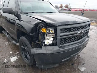 2015 Chevrolet Silverado 1500 LS with VIN 1GCRCPEH5FZ410299, listed as a IAAI auction lot 41106429 with 154,124 mi miles and . Bid and sale history available at DreamBid. Image 6.