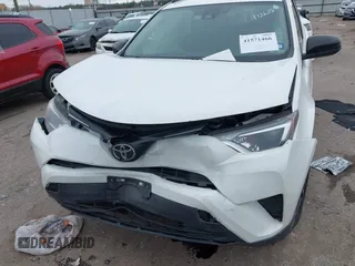 2017 Toyota RAV4 LE with VIN JTMZFREV1HJ103223, listed as a IAAI auction lot 41571466 with 96,860 mi miles and . Bid and sale history available at carsss.com. Image 6.