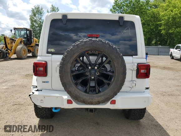 2021 Jeep Wrangler Unlimited Sahara with VIN 1C4JJXP63MW807717, listed as a Copart auction lot 59731465 with 50,799 mi miles and Clean title. Bid and sale history available at DreamBid. Image 6.