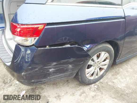 2016 Honda Odyssey SE with VIN 5FNRL5H38GB111448, listed as a IAAI auction lot 41754302 with 114,282 mi miles and . Bid and sale history available at DreamBid. Image 6.