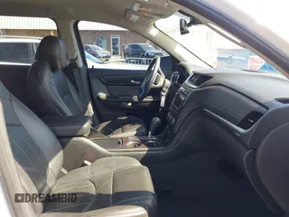 2016 Chevrolet Traverse LTZ z VIN 1GNKRJKDXGJ265413, wystawiony jako IAAI lot #42001292 z przebiegiem 157 129 mil mil oraz . Historia ofert i sprzedaży dostępna na DreamBid. Obrazek 5.