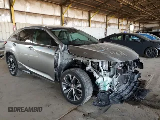 2017 Lexus RX 450h with VIN 2T2BGMCA2HC012194, listed as a Copart auction lot 63119545 with 33,601 mi miles and Salvage title. Bid and sale history available at DreamBid. Image 4.