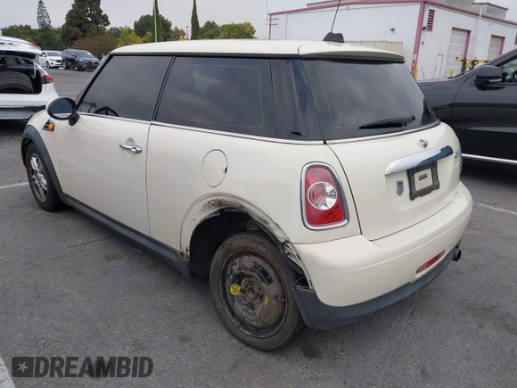 2011 MINI Hardtop with VIN WMWSU3C56BT093403, listed as a IAAI auction lot 42795188 with 123,454 mi miles and . Bid and sale history available at DreamBid. Image 3.