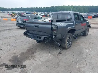 2022 Toyota Tacoma SR with VIN 3TMCZ5AN2NM507478, listed as a IAAI auction lot 42425907 with 40,796 mi miles and . Bid and sale history available at DreamBid. Image 4.