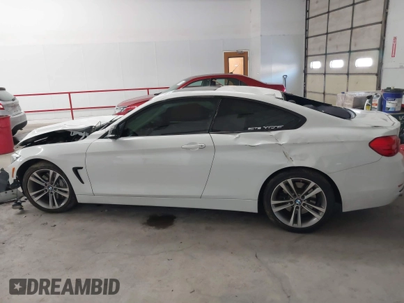 2015 BMW 4 Series 435i с VIN WBA3R1C50FK193678, выставлен на аукционе IAAI как лот 41603410 с пробегом 118 318 миль миль и . История ставок и продаж доступна на DreamBid. Изображение 14.