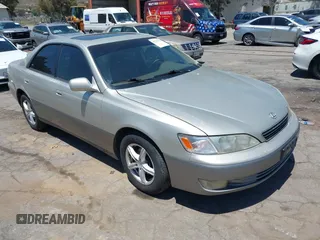 1998 Lexus ES 300 with VIN JT8BF28GXW5013529, listed as a IAAI auction lot 42232730 with 302,935 mi miles and . Bid and sale history available at DreamBid. Image 1.