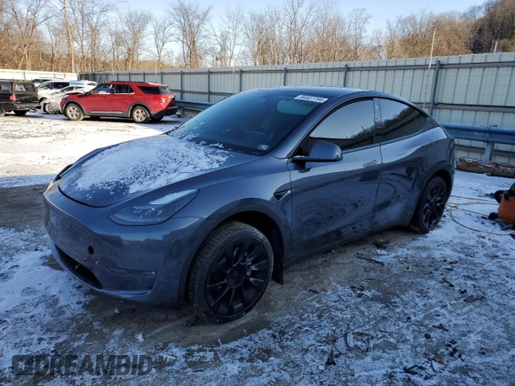 2023 Tesla Model Y Long Range with VIN 7SAYGDEE6PF752570, listed as a Copart auction lot 84927794 with 52,297 mi miles and Salvage Title. Bid and sale history available at DreamBid. Image 1.