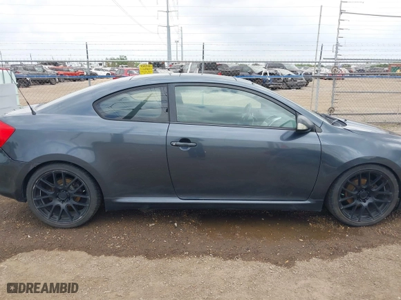 2007 Scion tC Spec with VIN JTKDE177X70160319, listed as a IAAI auction lot 41864140 with 200,184 mi miles. Bid and sale history available at carsss.com. Image 13.
