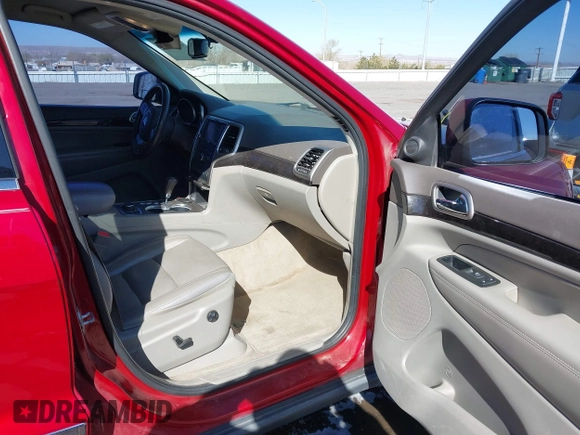 2011 Jeep Grand Cherokee 70th Anniversary with VIN 1J4RR4GT2BC703163, listed as a IAAI auction lot 41763149 with 184,523 mi miles. Bid and sale history available at carsss.com. Image 5.