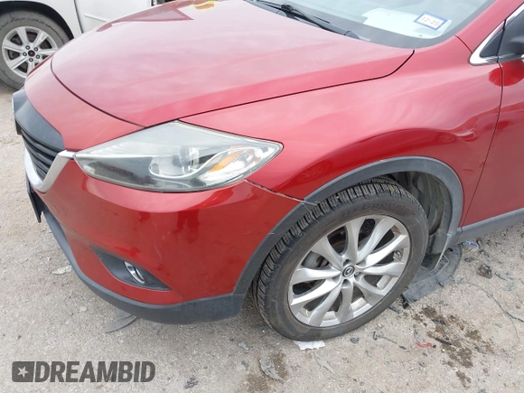 2015 Mazda CX-9 Grand Touring with VIN JM3TB2DA6F0460785, listed as a IAAI auction lot 42474705 with 62,202 mi miles and . Bid and sale history available at DreamBid. Image 6.