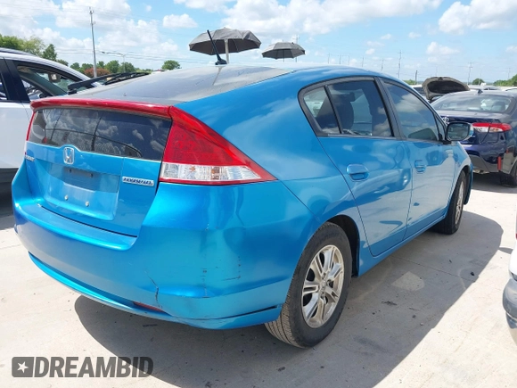 2010 Honda Insight EX with VIN JHMZE2H71AS003290, listed as a IAAI auction lot 42601332 with 163,510 mi miles and . Bid and sale history available at DreamBid. Image 4.