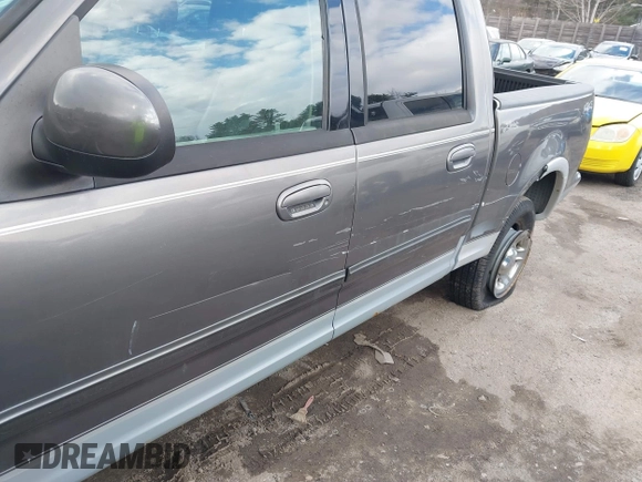 2003 Ford F-150 XLT with VIN 1FTRW08L63KA37275, listed as a IAAI auction lot 41875128 with 133,257 mi miles. Bid and sale history available at carsss.com. Image 6.