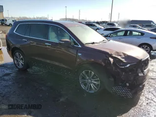 2023 Cadillac XT6 AWD Premium Luxury z VIN 1GYKPDRS0PZ112068, wystawiony jako Copart lot #46538575 z przebiegiem 52 016 mil mil oraz Szkoda całkowita • Salvage title. Historia ofert i sprzedaży dostępna na DreamBid. Obrazek 4.