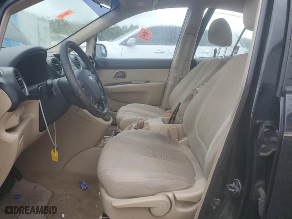 2007 Kia Rondo EX with VIN KNAFG526677042238, listed as a Copart auction lot 70869634 with 152,464 mi miles and Salvage Title. Bid and sale history available at carsss.com. Image 7.