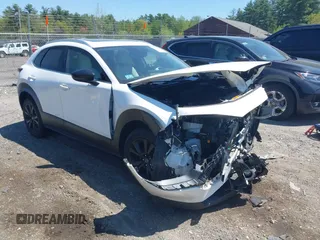 2023 Mazda CX-30 Premium with VIN 3MVDMBDY8PM583652, listed as a IAAI auction lot 42221466 with 56,845 mi miles and . Bid and sale history available at DreamBid. Image 1.