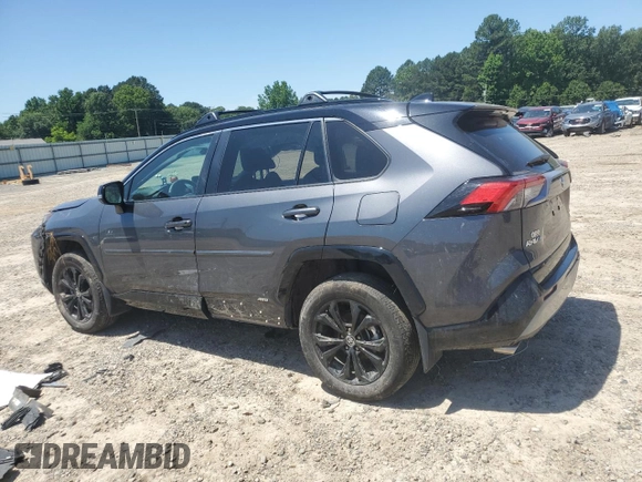 2023 Toyota RAV4 Hybrid XSE with VIN 2T3E6RFV9PW039963, listed as a Copart auction lot 57594335 with 27,486 mi miles and Salvage title. Bid and sale history available at DreamBid. Image 2.