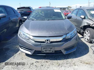 2016 Honda Civic EX with VIN 2HGFC2F74GH550780, listed as a IAAI auction lot 42135678 with 125,005 mi miles and . Bid and sale history available at DreamBid. Image 12.