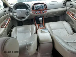 2004 Toyota Camry LE z VIN JTDBE32K440281087, wystawiony jako Copart lot #60486995 z przebiegiem 229 856 mil mil oraz Czysty tytuł • Clean title. Historia ofert i sprzedaży dostępna na DreamBid. Obrazek 9.