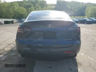 2022 Tesla Model Y Long Range z VIN 7SAYGDEE1NF430383, wystawiony jako Copart lot #56208825 z przebiegiem 60 612 mil mil oraz Szkoda całkowita • Salvage title. Historia ofert i sprzedaży dostępna na DreamBid. Obrazek 6.