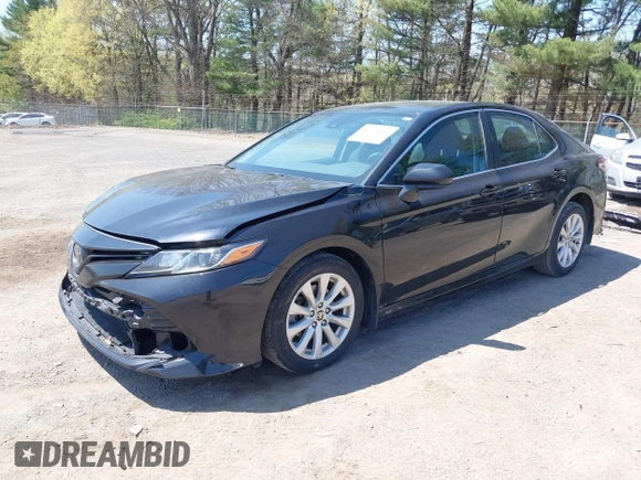 2020 Toyota Camry LE with VIN 4T1C11AK9LU387012, listed as a IAAI auction lot 42103647 with 64,049 mi miles and . Bid and sale history available at carsss.com. Image 19.