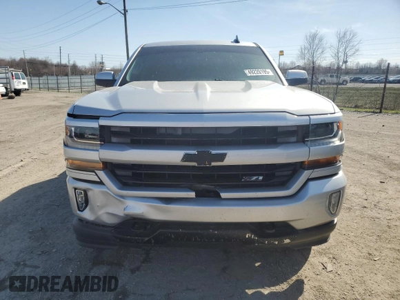 2016 Chevrolet Silverado 1500 LT with VIN 3GCUKREC9GG299772, listed as a Copart auction lot 49220195 with 154,613 mi miles and Salvage Title. Bid and sale history available at DreamBid. Image 5.