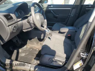 2010 Volkswagen Jetta S with VIN 3VWJZ7AJ1AM032185, listed as a Copart auction lot 58562615 with 189,752 mi miles and Salvage title. Bid and sale history available at DreamBid. Image 7.