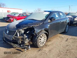 2010 Suzuki Kizashi SE with VIN JS2RE9A34A6100807, listed as a IAAI auction lot 41690974 with 122,419 mi miles and . Bid and sale history available at DreamBid. Image 17.