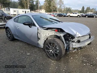 2024 Toyota GR86 with VIN JF1ZNBB19R9760940, listed as a Copart auction lot 83698454 with 36 mi miles and Salvage Title. Bid and sale history available at carsss.com. Image 4.